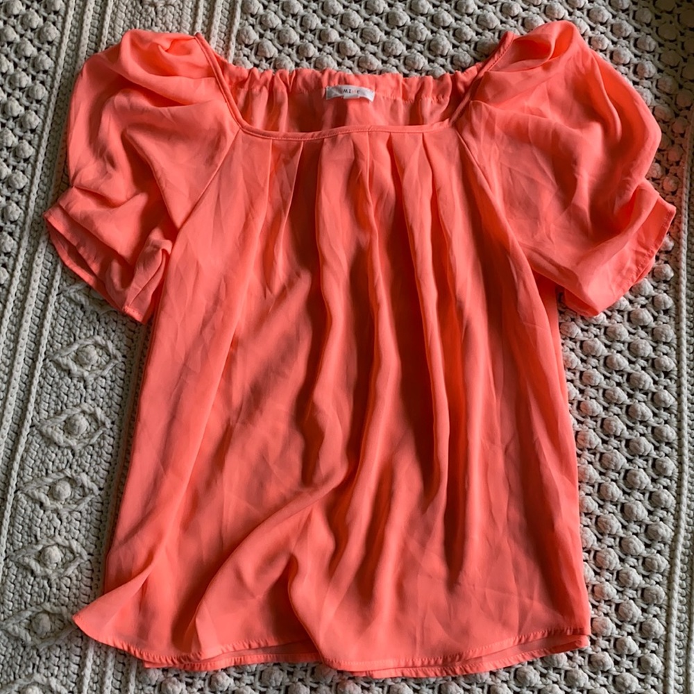 Neon coral ruffle top